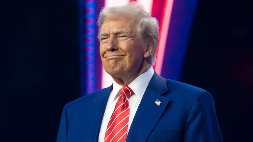 President-elect Donald Trump smiles during Turning Point USA's AmericaFest at the Phoenix Convention Center on December 22, 2024 in Phoenix, Arizona. The annual four day conference geared toward energizing and connecting conservative youth hosts some of the country's leading conservative politicians and activists. (Photo by Rebecca Noble/Getty Images)